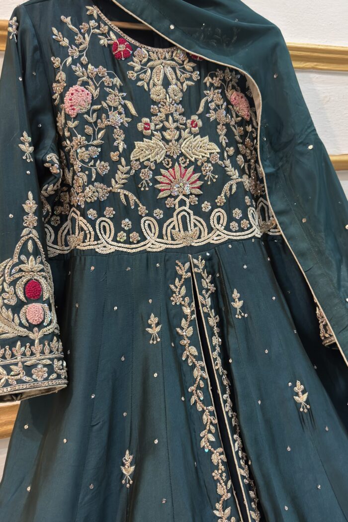 ZARNOUSH emerald green tissue silk Anarkali gown with gold embroidery | AYZAL HASSAN